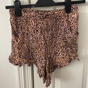 WORN ONCE Isabelle’s Cabinet cheetah flare/flowy shorts